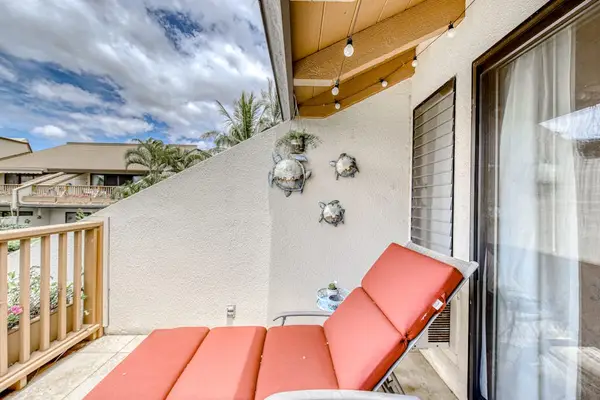 Relax on your private lanai with tropical breezes