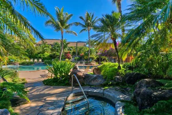 Peaceful hot tub surrounded by tropical gardens