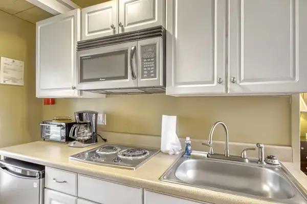 Modern kitchen with ample counter space for effortless meal preparation during your stay