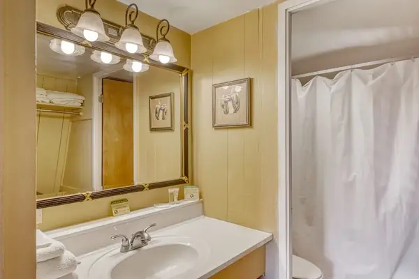 Clean full bathroom featuring modern fixtures for refreshing starts and relaxing evenings daily
