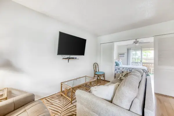 Alternate Angle of Living Space connected to Bedroom with Sliding Partition