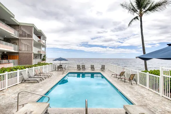 Oceanfront Pool Deck with Lounge Chairs overlooking the Pacific Ocean