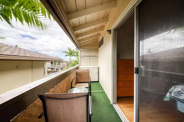 Private Covered Lanai with Outdoor Seating & Tropical Views