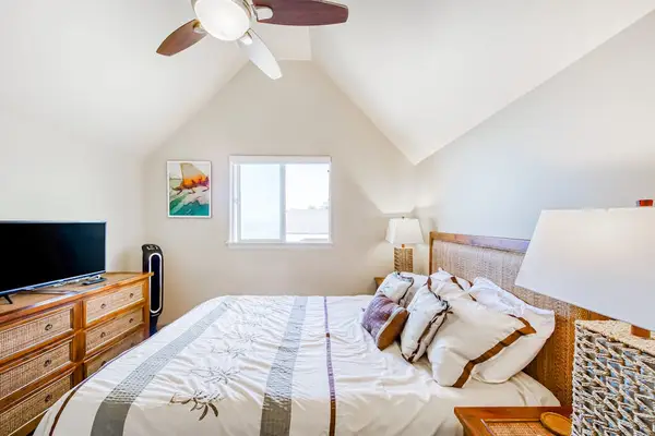 Cozy Bedroom Under Vaulted Ceilings
