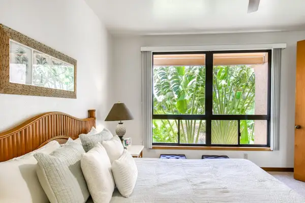 Peaceful Primary Bedroom With Garden Views