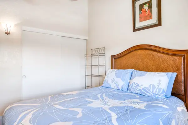 Bright bedroom with a comfortable bed