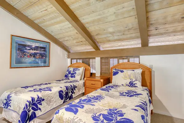 Loft bedroom with two comfortable beds