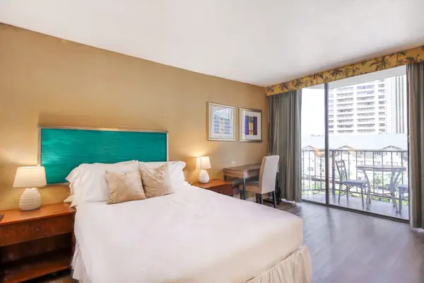 Comfortable double bed in a welcoming studio space