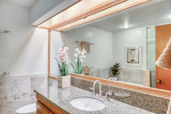 Elegant Vanity With Resort Inspired Finishes