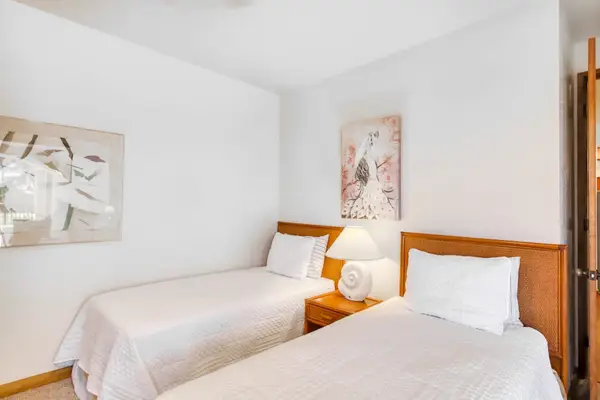 Bright Guest Bedroom With Island Charm