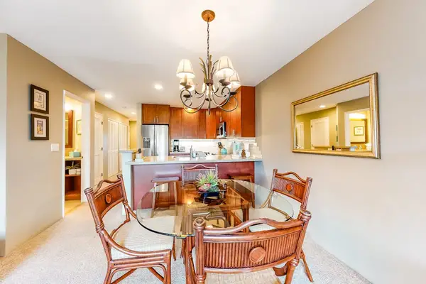 Bright dining area connects naturally with the welcoming kitchen nearby