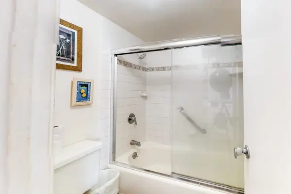Refresh and unwind in the full bathroom featuring a relaxing bathtub and shower