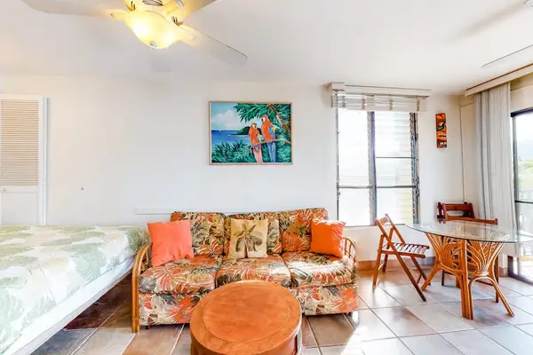 A cozy sitting and dining area creates a practical and inviting space for your stay