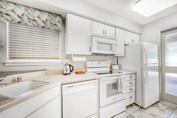 Fully equipped kitchen for preparing home-cooked meals.