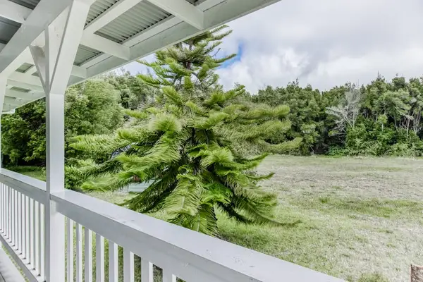 Peaceful Lanai Overlooking Lush Greenery