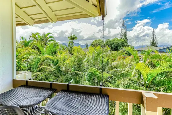 Peaceful Lanai Surrounded By Lush Greenery