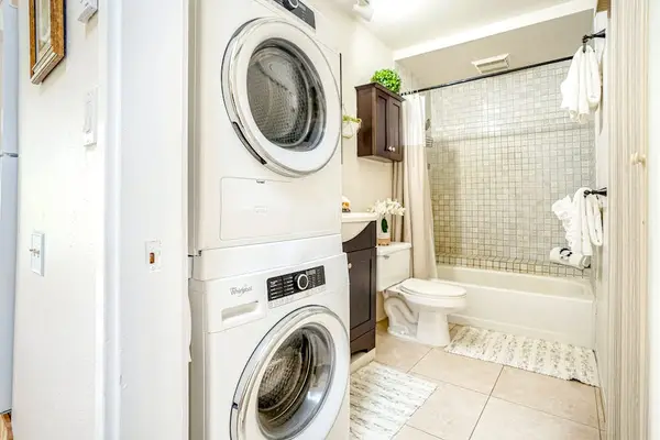 Convenient Laundry Area For A Carefree Stay