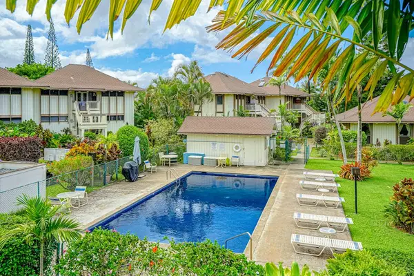 Refreshing Pool Surrounded By Tropical Beauty
