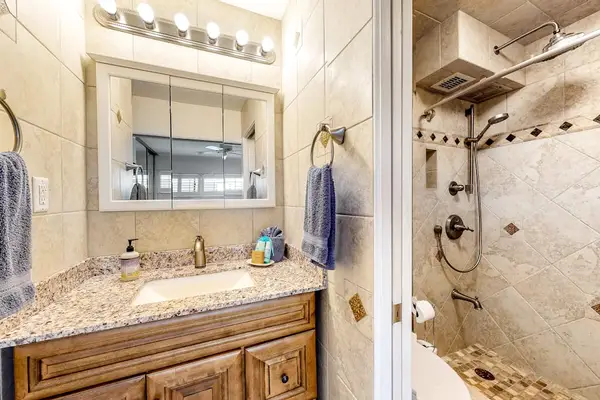 Guest bathroom with walk-in shower.