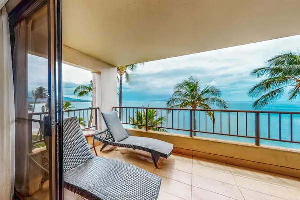 Picturesque views from your penthouse lanai.  This large lanai has plenty of space for morning coffee or relaxing on your chaise lounger.