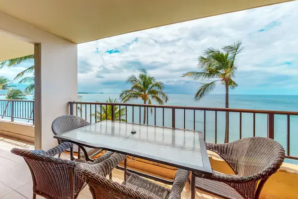 Picturesque views from your penthouse lanai.  This large lanai has plenty of space for morning coffee or relaxing on your chaise lounger.