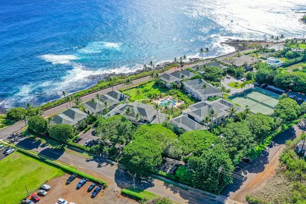 Aerial view showing the home's surrounding neighborhood