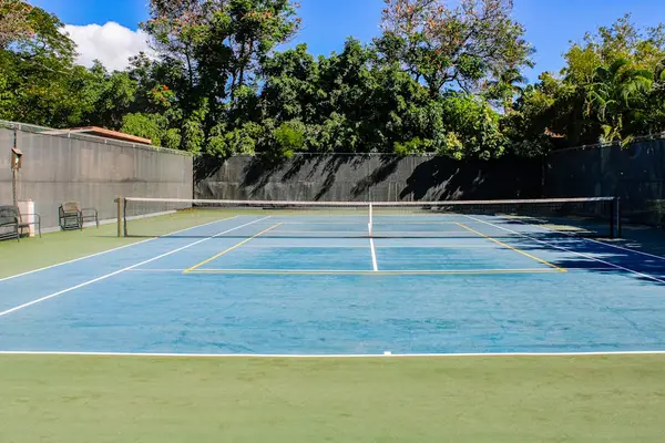 Full View of On-Site Tennis Court Facilities