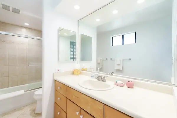 Guest bathroom with tub/shower combo.