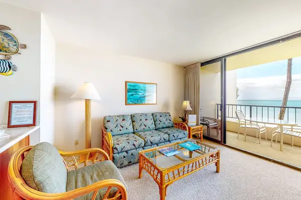 Lovely living room with sleeper sofa, flat screen tv and views of the Pacific Ocean.