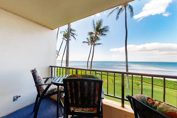 Front-Row Seat To Swaying Palms And Waves