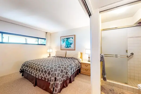 Bed room offering a king size bed and private bathroom