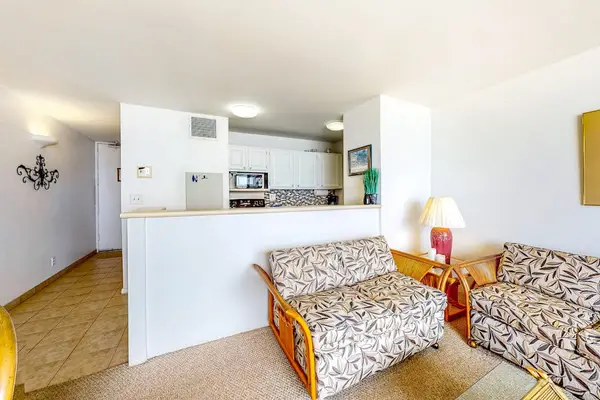 Bright, open-concept living room and kitchen area