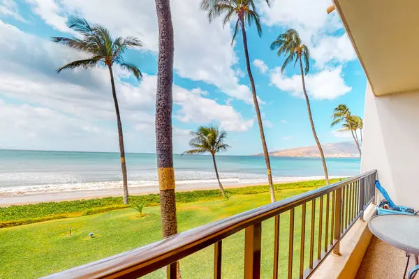 Private balcony overlooking the sandy shoreline