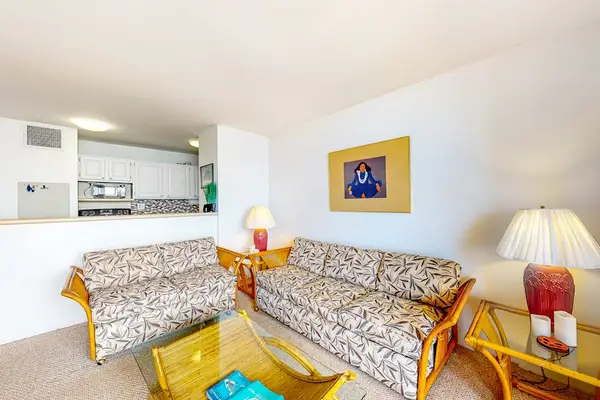Bright, open-concept living room and kitchen area