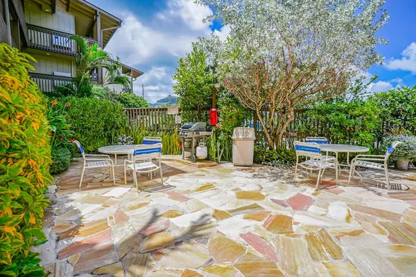 Spacious Backyard with Tropical Landscaping