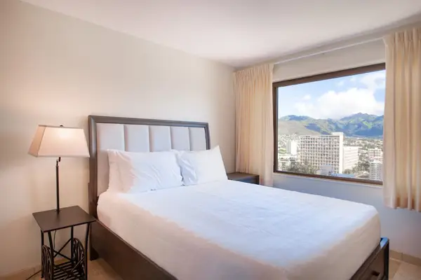 Wake up to stunning mountain and Waikiki skyline views from the comfortable queen bedroom.