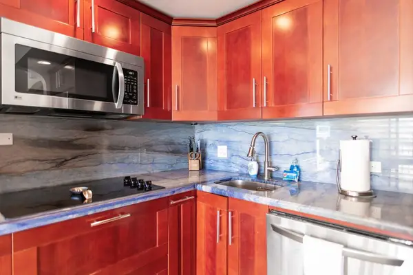 Well-appointed kitchen with modern appliances, generous counter space, and all the essentials for your stay.