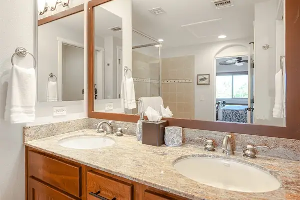 Master en-suite bathroom with double sinks, garden tub and walk-in shower.