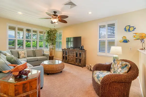 Open living space with natural light and cozy furnishings