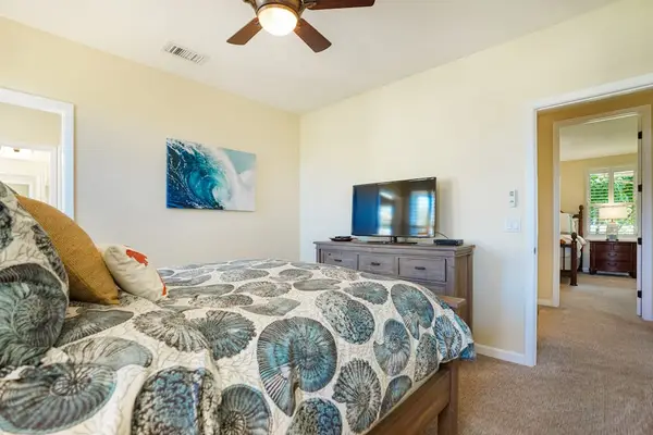 Comfortable queen bedroom with a private lanai entrance