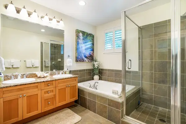 Spacious ensuite with a walk-in shower and modern finishes