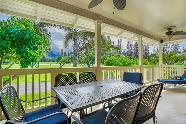 Covered porch with outdoor dining table, perfect for morning coffee