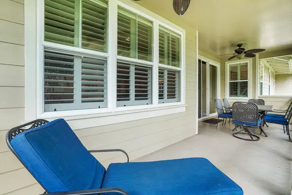 Bright porch with comfortable loungers for relaxing