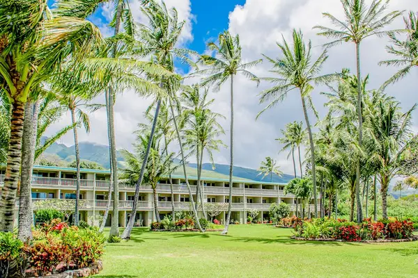 Experience a tranquil resort atmosphere with lush landscapes and welcoming outdoor spaces throughout