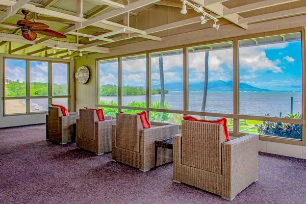 Covered patio provides a shaded retreat with beautiful panoramic views and fresh island air