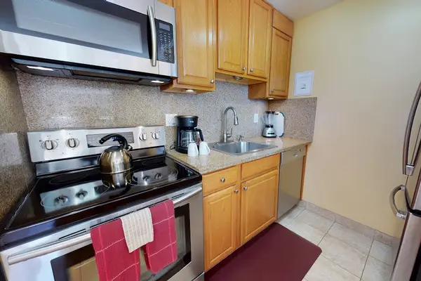 Gourmet Kitchen Setup Complete With Modern Stainless Appliances