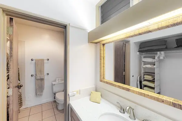 Clean full bathroom featuring modern fixtures and fresh towels for every stay