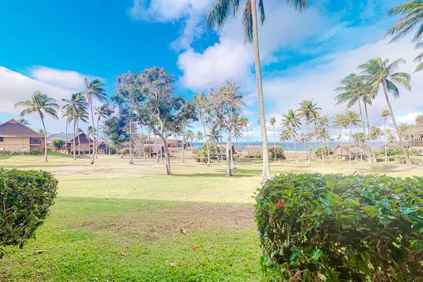 Lush resort greenery creates a peaceful setting for relaxing island escapes together