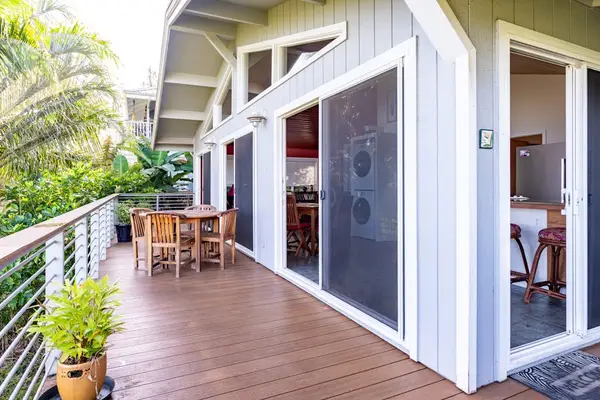 Sunlit Wraparound Deck featuring Outdoor Dining & Kitchen Access