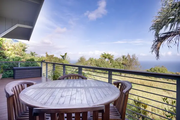 Outdoor Wooden Dining Table on Deck Perfect for Al Fresco Meals